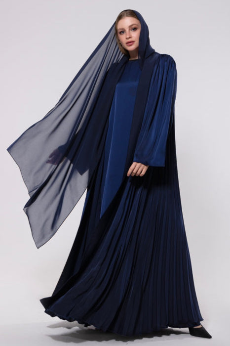 Blue blur abaya made from flowing, soft silk, featuring back pleats for graceful movement and an elegant design.