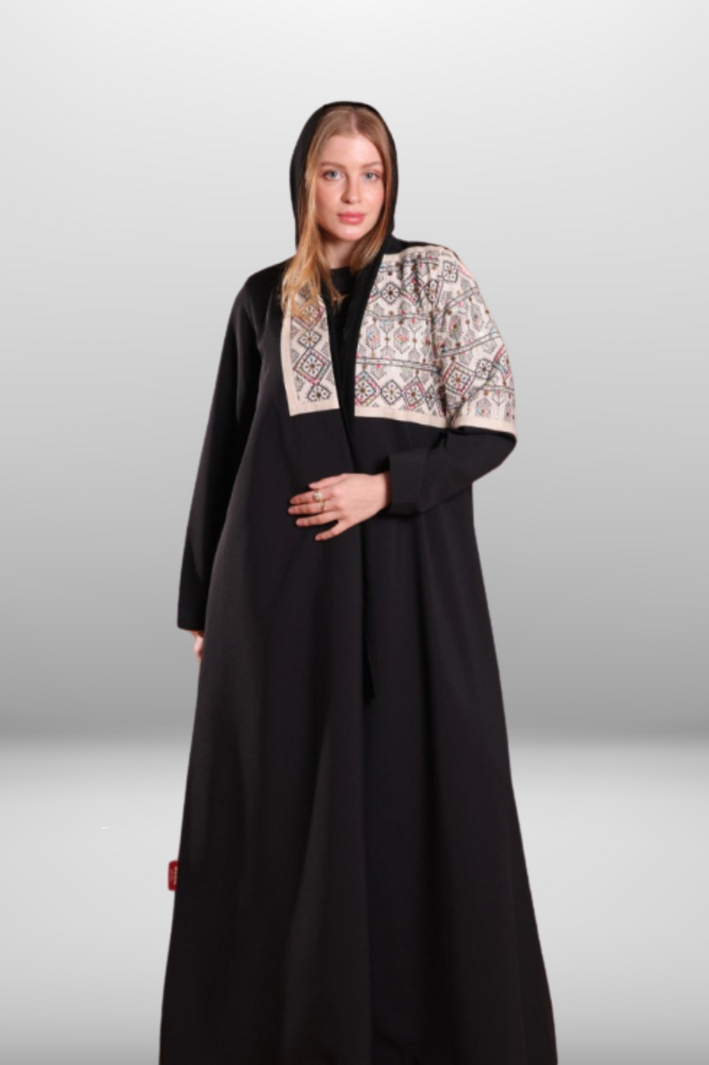 Premium black abaya with beige embroidered panel, combining luxurious fabric with intricate detailing for a refined look.