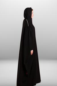 Soft premium fabric abaya with an elegant drape, offering a graceful and sophisticated look.