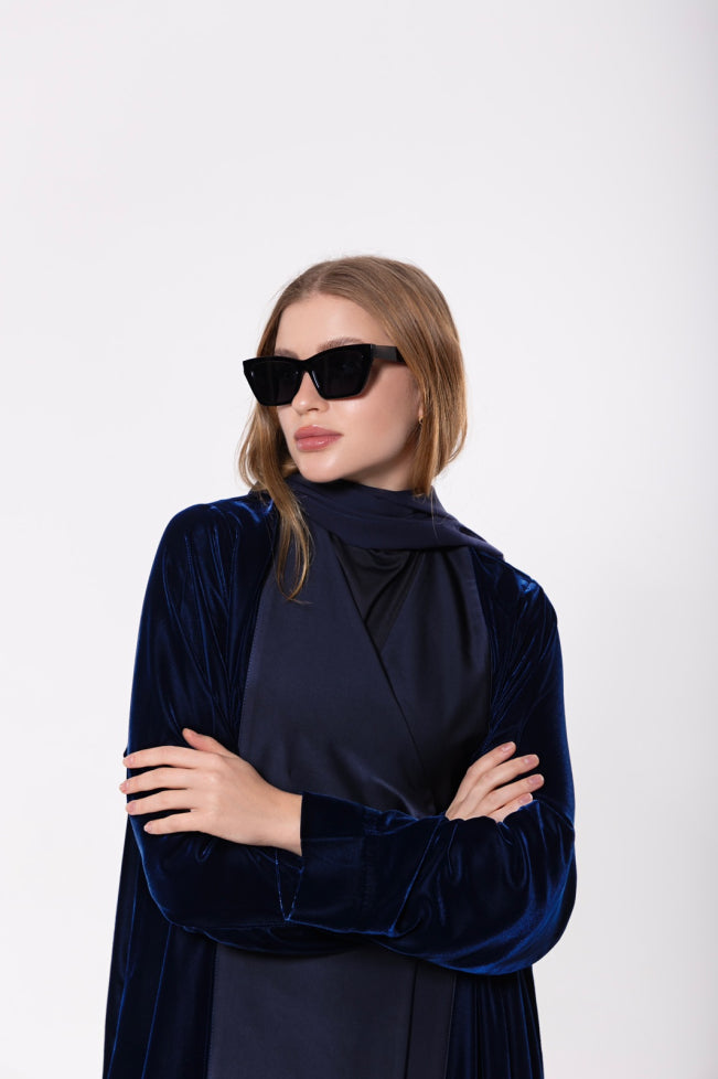 Royal blue abaya made from a luxurious blend of premium velvet and silk, offering a sophisticated and elegant look.
