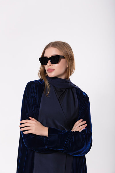 Royal blue abaya made from a luxurious blend of premium velvet and silk, offering a sophisticated and elegant look.