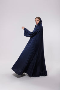 Blue blur abaya made from flowing, soft silk, featuring back pleats for graceful movement and an elegant design.