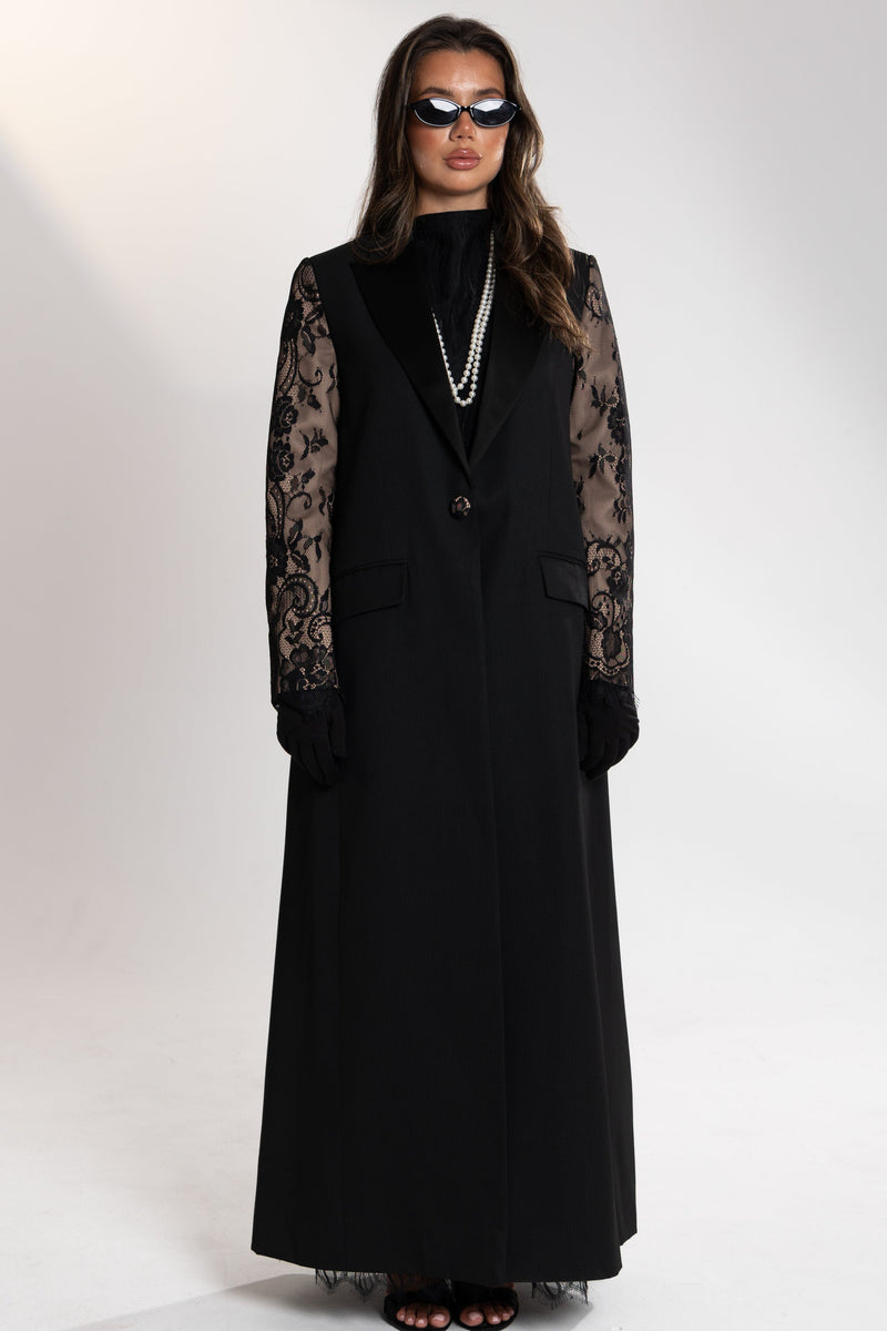 model wearing a back lace blazer abaya by esme 