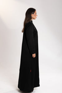 Rear view of Esme Abaya full-length black dress, luxury modest fashion