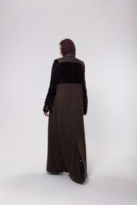 Deep brown abaya crafted from soft, premium velvet, offering a rich and luxurious look with a graceful silhouette.