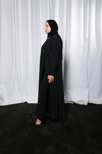 Bow Charm abaya styled in open front look showing layered modest fashion styling