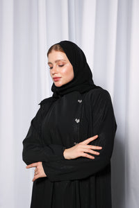 Complete outfit look of Bow Charm abaya styled for formal and modest occasions