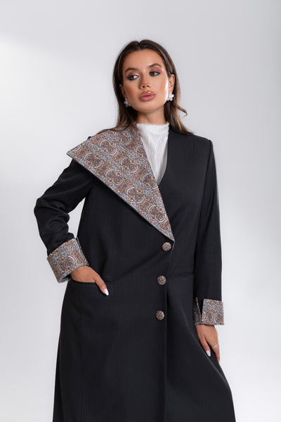 Model wearing Esme Abaya gray embroidered blazer in doha qatar
