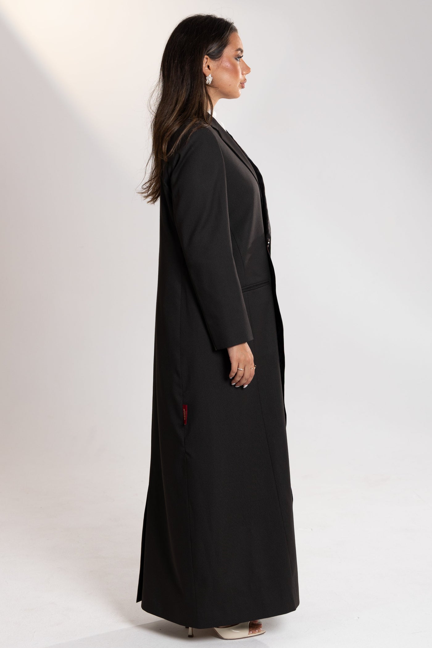 Woman wearing Esme Abaya limited edition modest outfit, Doha Qatar