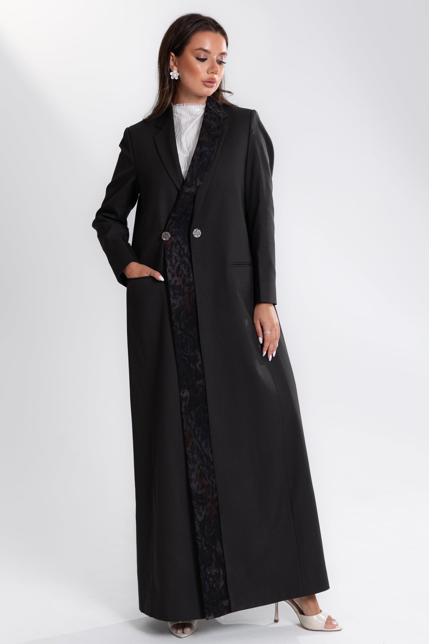 Woman wearing Esme Abaya limited edition modest outfit, Doha Qatar