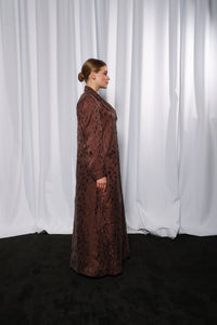 Back view of Esmeabaya Blush Pink Blazer showcasing sleek cut and refined stitching