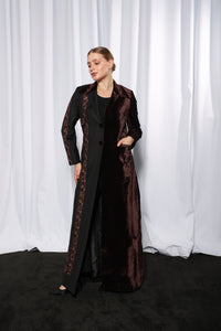 Side profile of Esmeabaya Cultural Fusion Brown Edition abaya highlighting structured modest fit