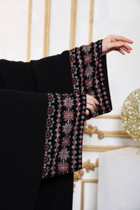 Fabric texture of Esmeabaya Gala Bisht Abaya in smooth high-quality material