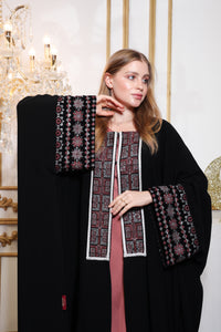 Side profile of Esmeabaya Gala Bisht Abaya highlighting structured fit and graceful fall