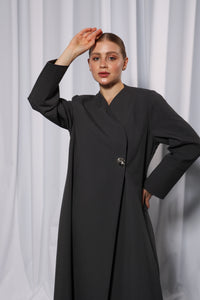 Back view of Esmeabaya Minimalistic Gray Abaya showcasing smooth drape and neat finish
