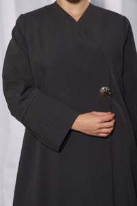 Flow and fall detail of Esmeabaya Minimalistic Gray Abaya with elegant minimal structure