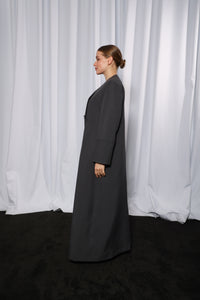 Side profile of Esmeabaya Minimalistic Gray Abaya highlighting straight modest cut