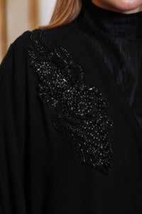 Flow and fall detail of Esmeabaya Nova Cape with graceful movement