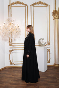 Side profile of Esmeabaya Nova Cape highlighting structured modest fit and fluid movement