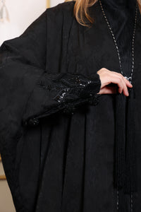 Close up design detail of Esmeabaya Regal Bisht Abaya showcasing premium tailoring and regal aesthetics