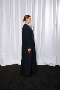 Side profile of Esmeabaya Royal Blue Abaya highlighting structured modest fit