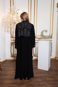Side profile of Esmeabaya Royal Nakhla Abaya highlighting structured fit and graceful fall