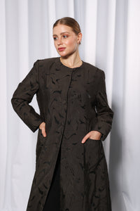 Fabric texture of Esmeabaya Soft Olive Abaya in soft breathable premium material
