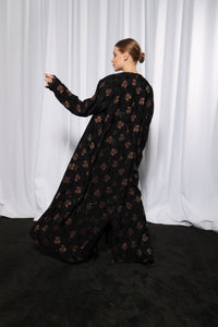 Back view of Flared Everyday abaya displaying smooth finish and elegant flow