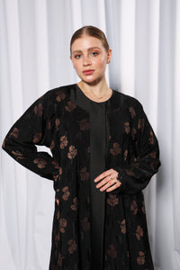 Flared Everyday abaya styled open showcasing movement and layered modest styling