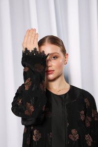 Flared Everyday abaya in motion emphasizing wide flare and fluid movement