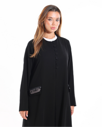 Full-length view of the Glow Pocket Abaya Black showcasing premium soft fabric, side slit, and elegant everyday abaya design.