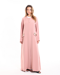 Glow Pockets abaya from Esme Abaya Summer '26 collection featuring stylish pockets and an elegant modest fashion design.