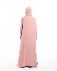 Glow Pockets abaya by Esme Abaya showcasing contemporary modest fashion with a refined and effortless summer style.