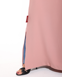 Glow Pockets modest abaya featuring a modern flowing style with elegant pockets for a sophisticated summer look.