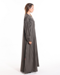Heart of Gold modest abaya by Esme Abaya featuring refined golden accents and an elegant contemporary look.