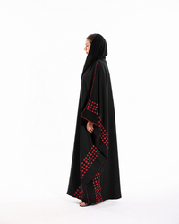 Matching black sheila with embroidered heart details styled with the Love Notes Bisht Black Variant from Esmeabaya Summer '26 Collection.