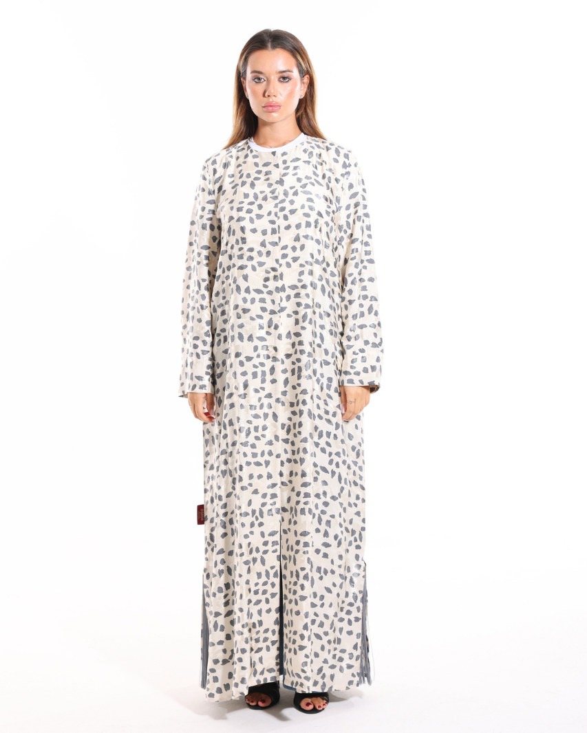 Marble Abaya front view featuring a grey and ivory marble-inspired print, concealed front closure, and elegant modest silhouette by Esmeabaya.