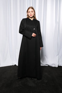 Minimalistic abaya styled open in layered modest outfit look