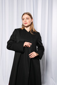 Front panel detail of Minimalistic abaya emphasizing structured simplicity