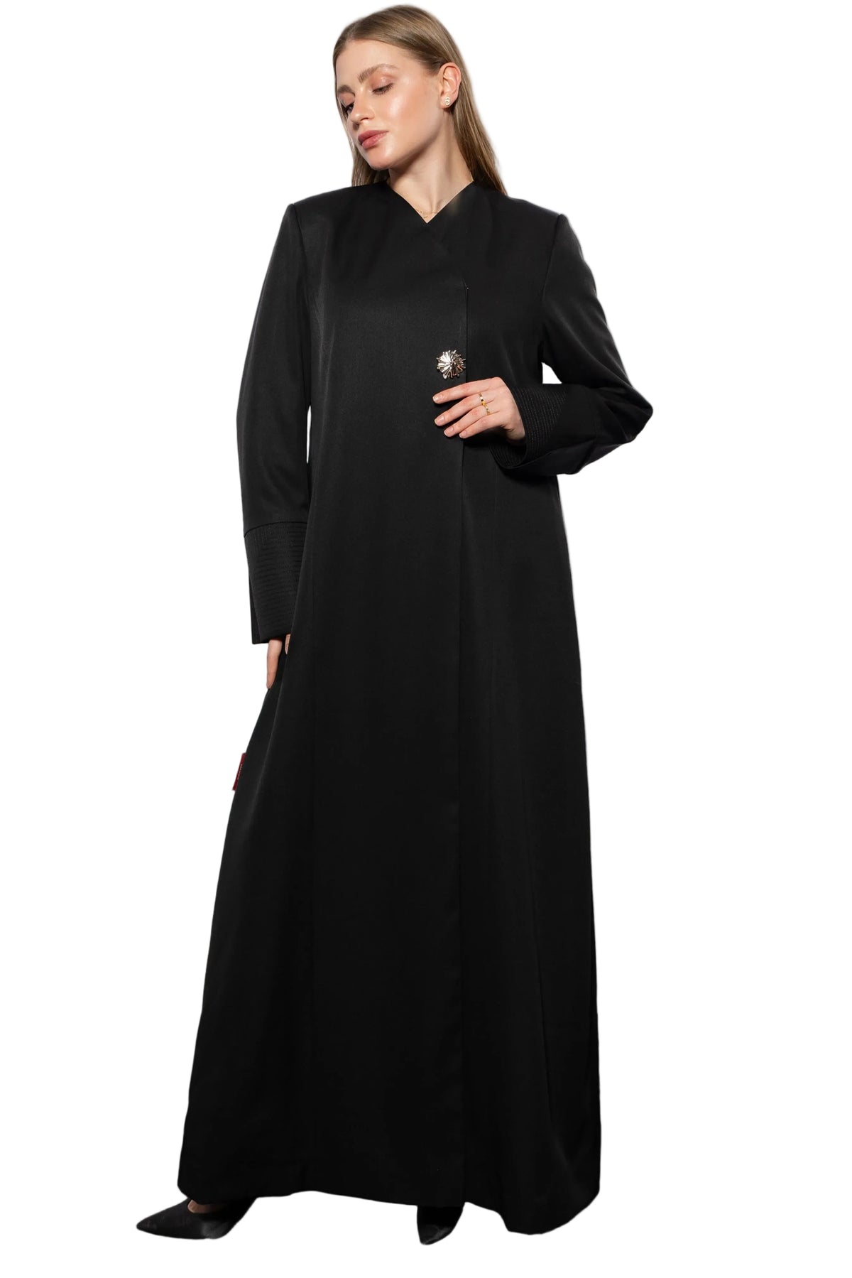 Minimalistic abaya front view featuring clean lines and elegant modest silhouette