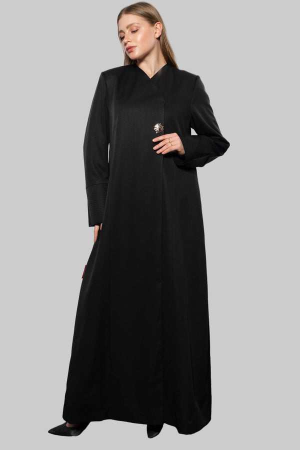 Minimalistic abaya front view featuring clean lines and elegant modest silhouette