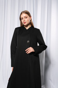 Three quarter side angle of Minimalistic abaya showing elegant silhouette