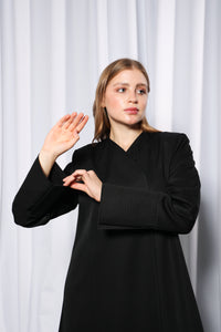 Minimalistic abaya in motion highlighting graceful flow and modern modest style