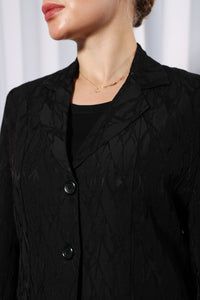Button and front panel detail of Rich Black Blazer abaya showing premium craftsmanship