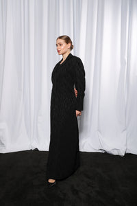 Side profile of Rich Black Blazer abaya highlighting structured tailoring and elegant drape