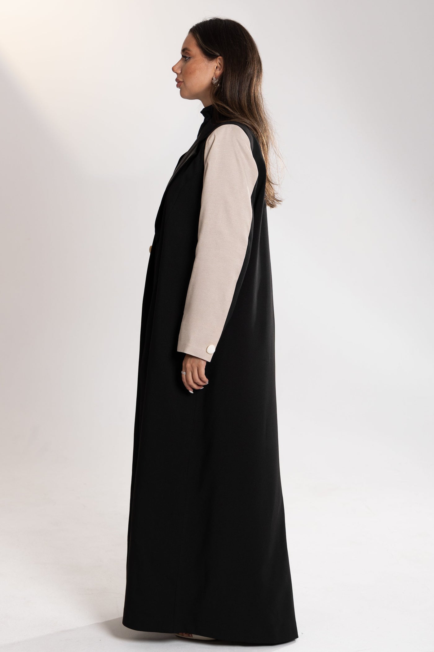 side shot of a woman wearing esme blazer from qatar