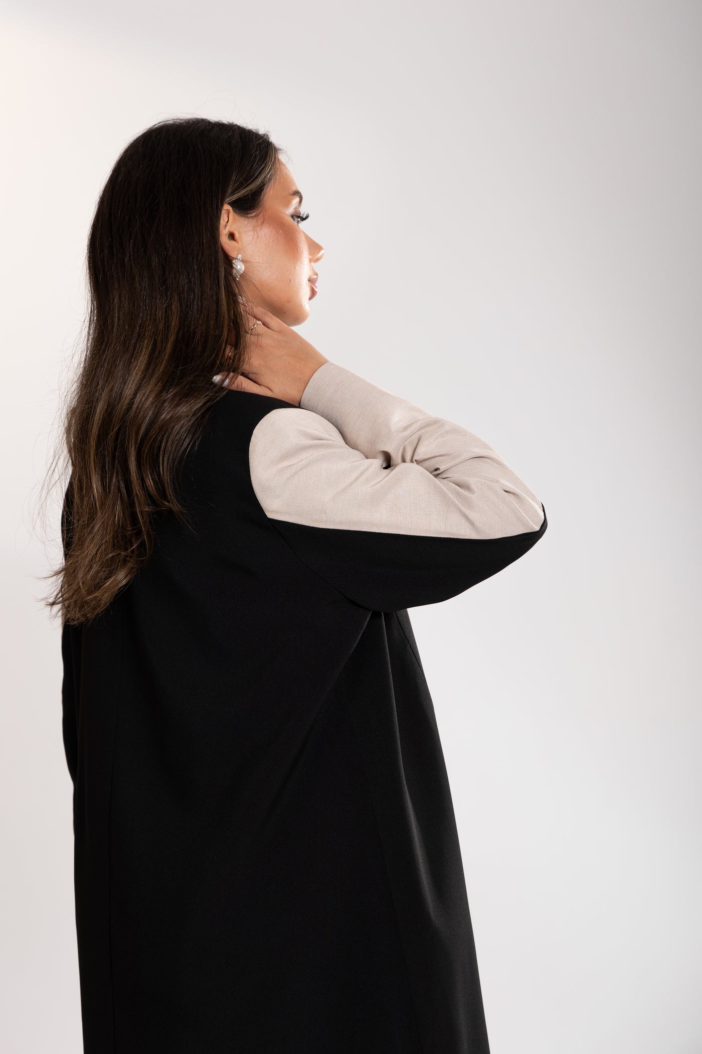 side sleeve shot of a woman wearing esme blazer from qatar