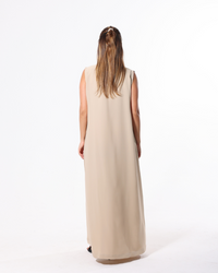 Close-up of the premium Korean fabric on the Soft Beige Inner Dress highlighting its smooth texture and graceful drape by Esmeabaya.