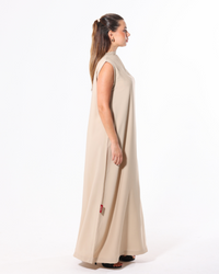 Full-length view of the Soft Beige Inner Dress showcasing luxurious Korean fabric and elegant modest layering for abayas.
