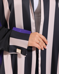 Stripe Studio Bisht featuring a sophisticated striped design and elegant flow for modern modest wear styling.